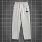 Men's solid color straight leg jogging pants, suitable for casual sports such as running, gym, and outdoor activities